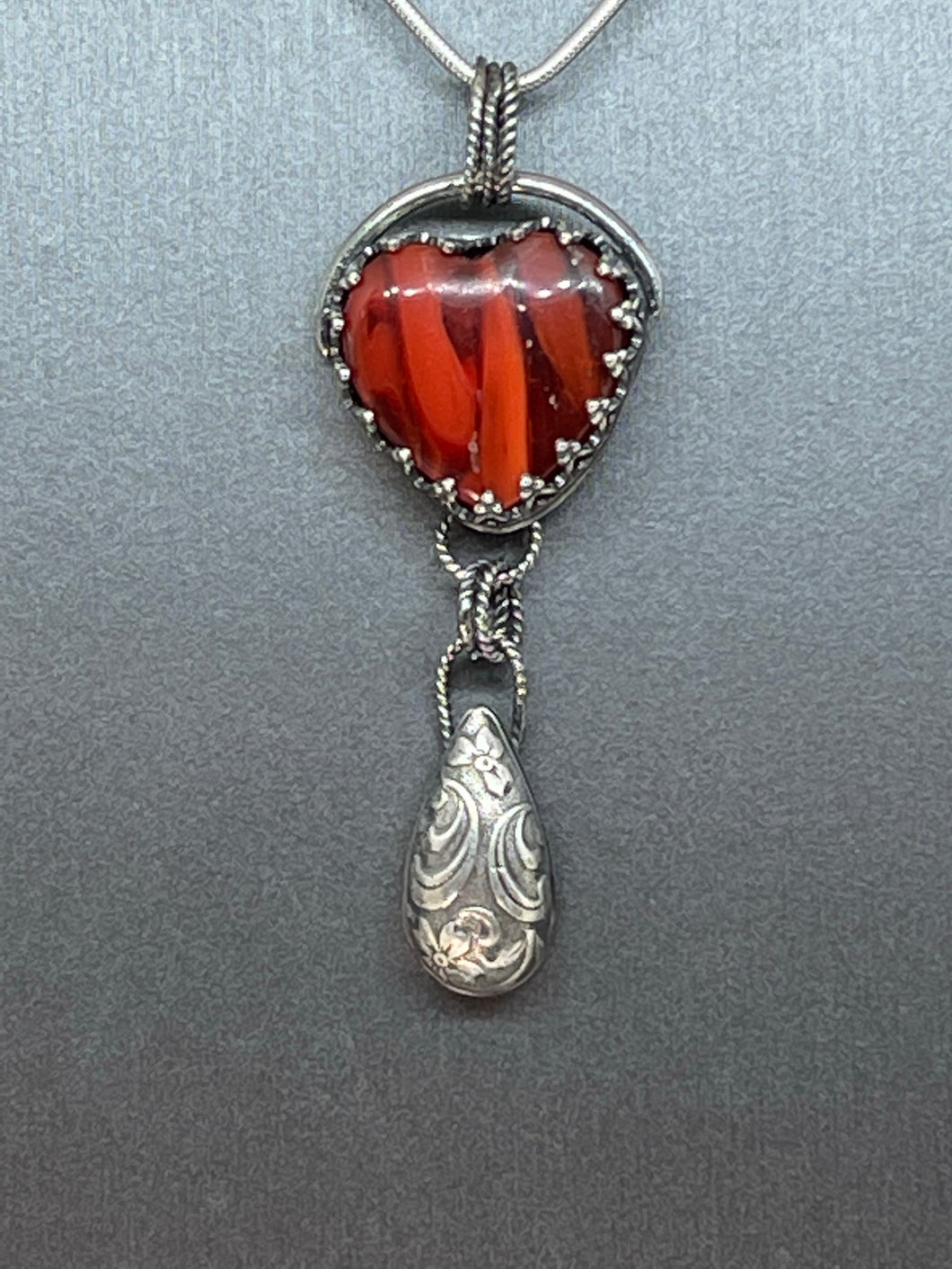 Fine Silver Pendant with Heart Shaped Red and Black Rosarita