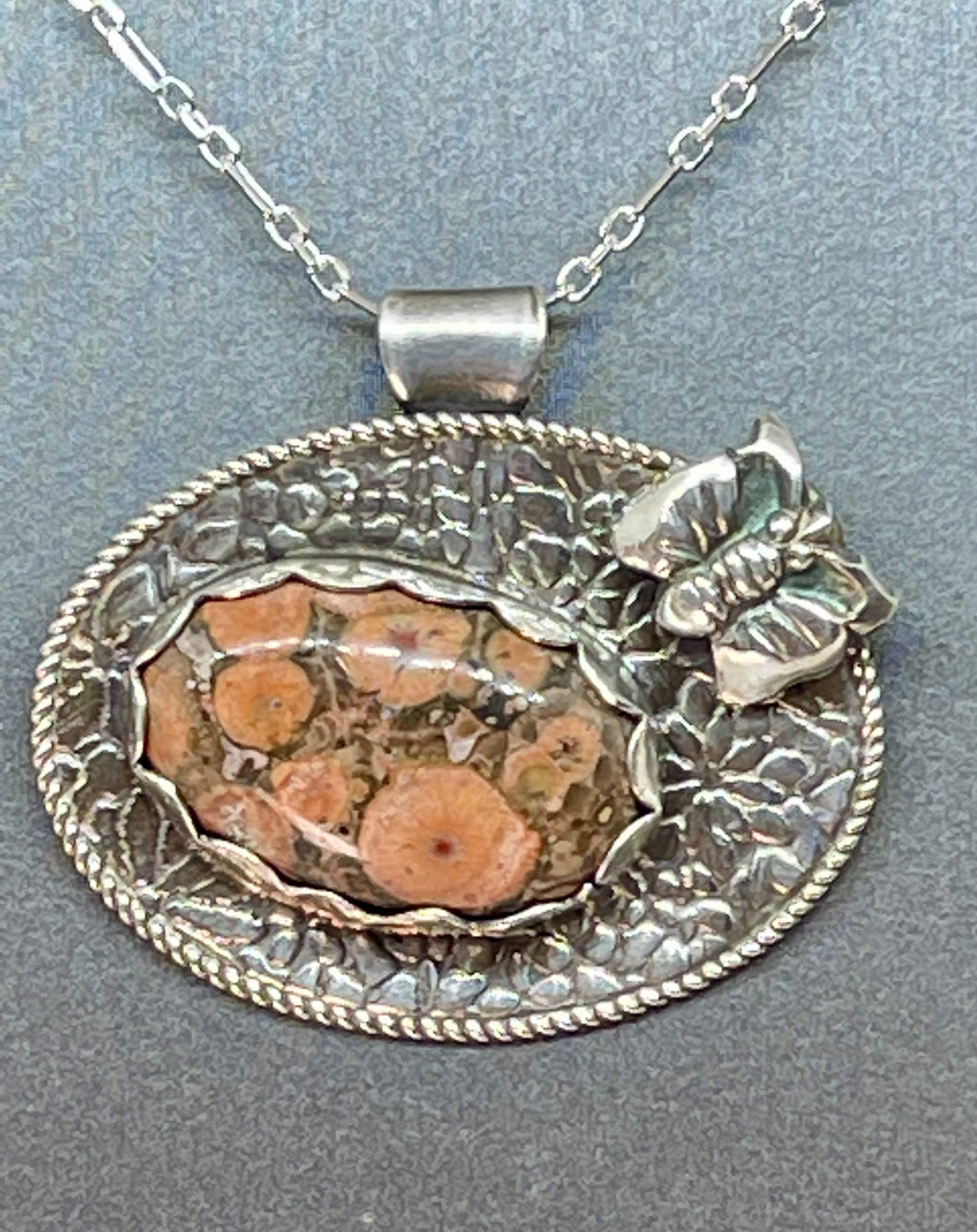 Oval Fine Silver and Salmon Colored Poppy Jasper Pendant